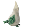 a small cockatiel figurine that appears to be made out of a parsnip